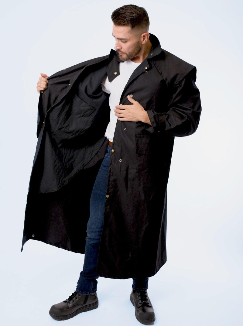 A man wearing claybourn oilskin riding coat