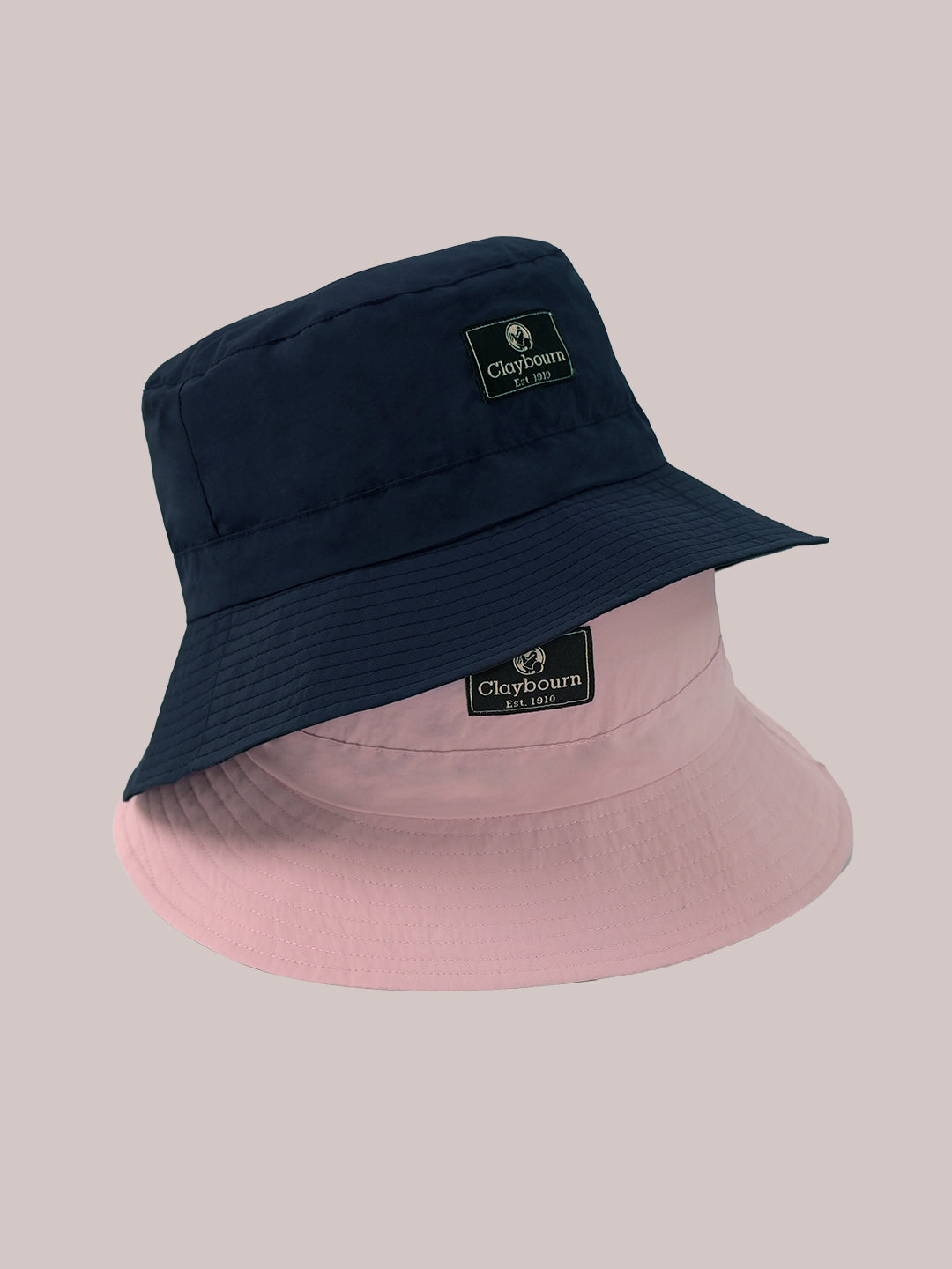 Pink and black bucket hats.